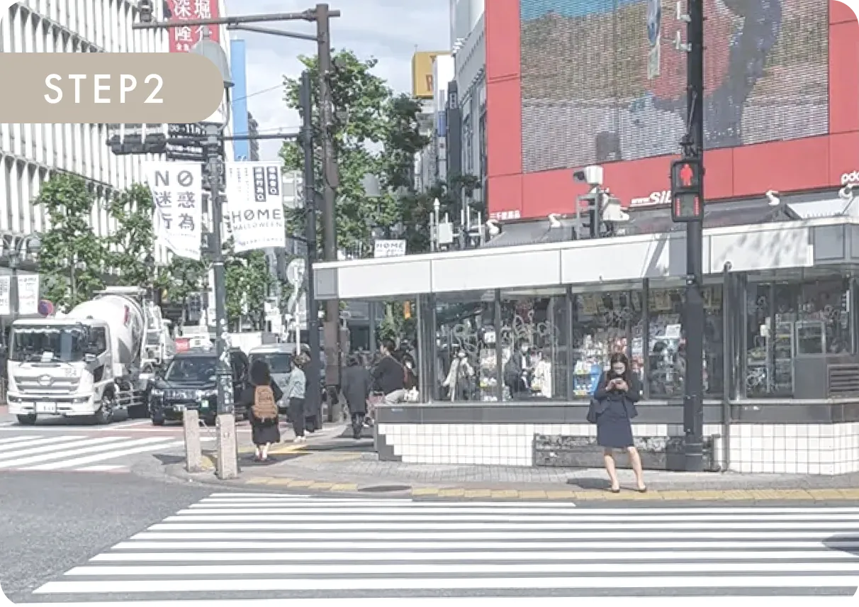 Step 2: Cross Shibuya Scramble Crossing toward Sanzenri Pharmacy.